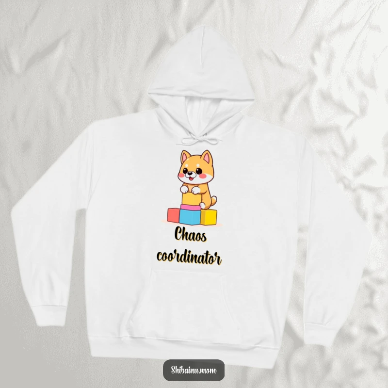 Funny Shiba Inu Hoodie featuring a dog balancing a stack of wobbly blocks. Cozy and humorous, a perfect funny gift.