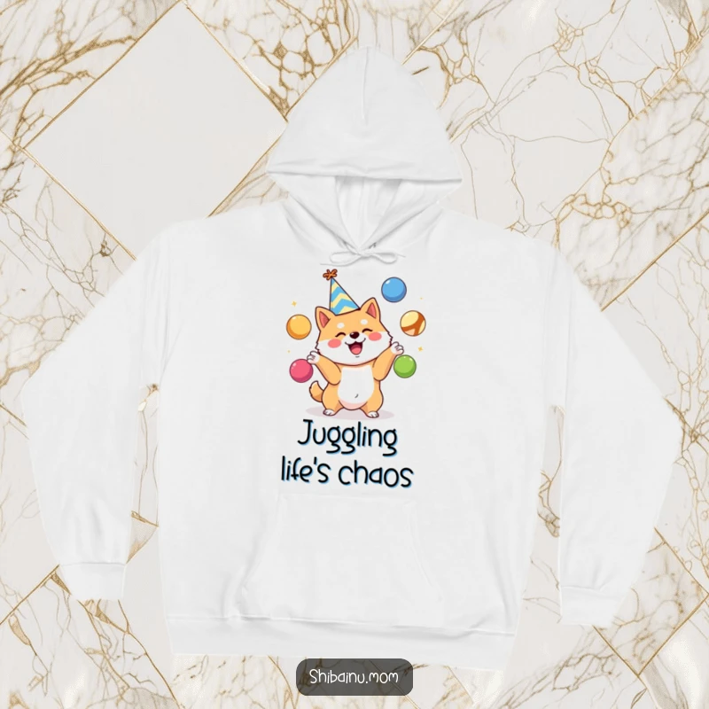 Funny Shiba Inu hoodie, party hat, excitedly juggling colorful balls, warm and festive apparel, a perfect funny gift.