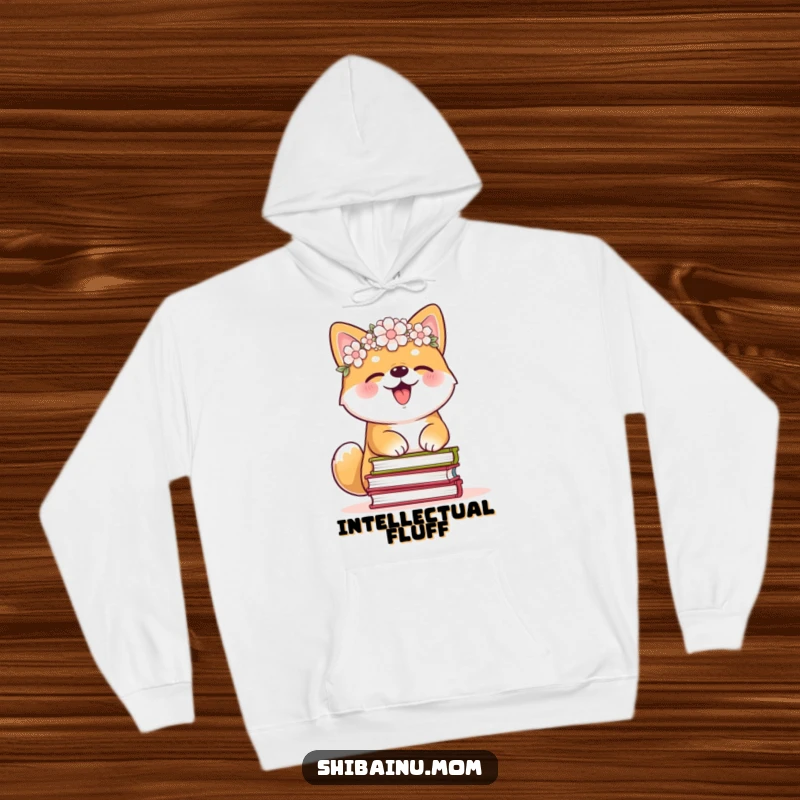Funny Shiba Inu hoodie with a flower crown, giggling hysterically while struggling to keep a stack of books balanced, perfect cozy reading apparel.