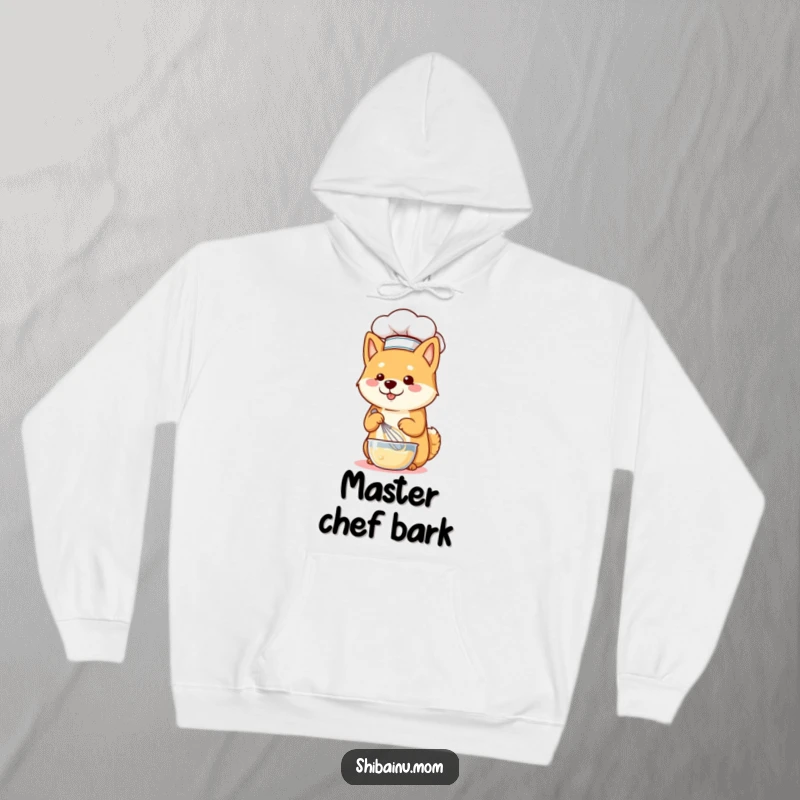 Funny Shiba Inu dog wearing a chef hat and whisking batter, looking cozy and ready to bake in a hooded sweatshirt.