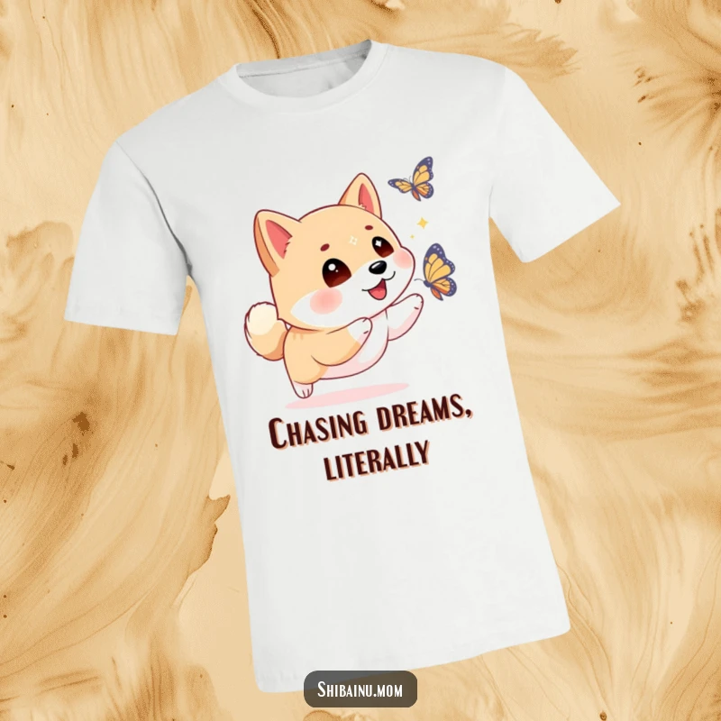 Funny Shiba Inu t-shirt showing sparkling eyes focused intensely on a butterfly, depicting a moment of playful, energetic pursuit.