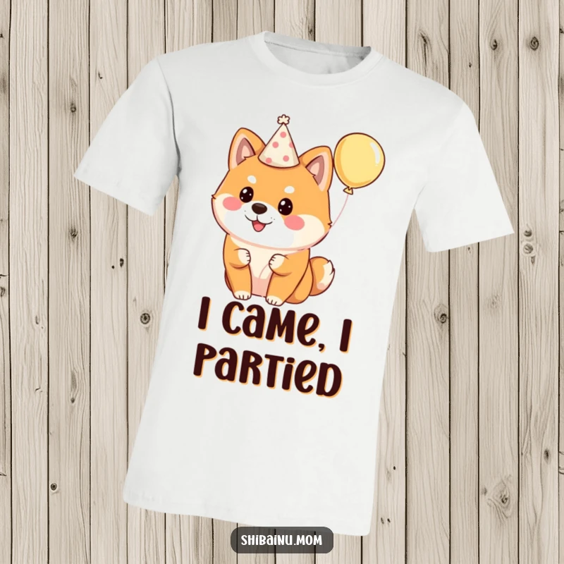 Funny Shiba Inu t-shirt depicting a fluffy dog wearing a party hat and holding a balloon, embodying pure celebratory joy.