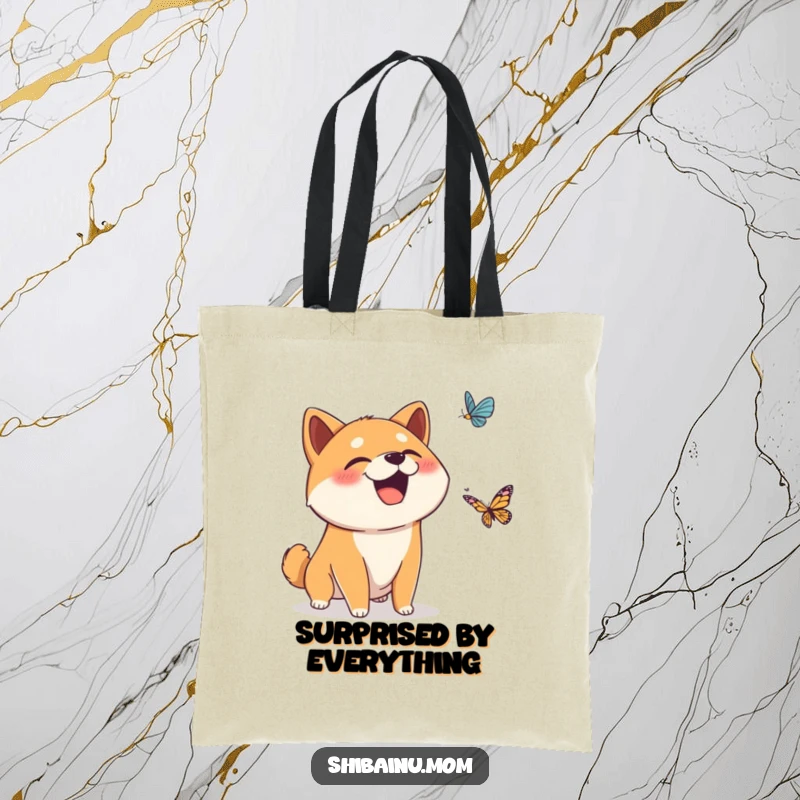 Funny tote bag featuring a surprised Shiba Inu dog giggling at a falling butterfly, ideal for carrying essentials with a touch of whimsical humor.